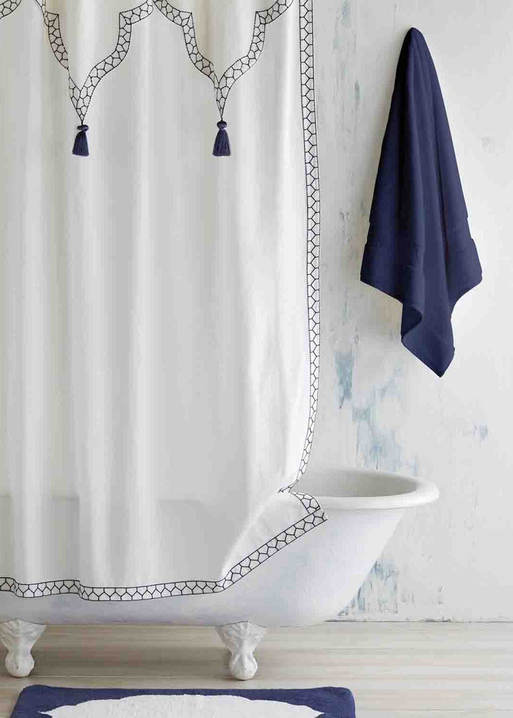 white cotton shower curtain with blue tassels, wholesale bath accessories to the trade at designer pricing
