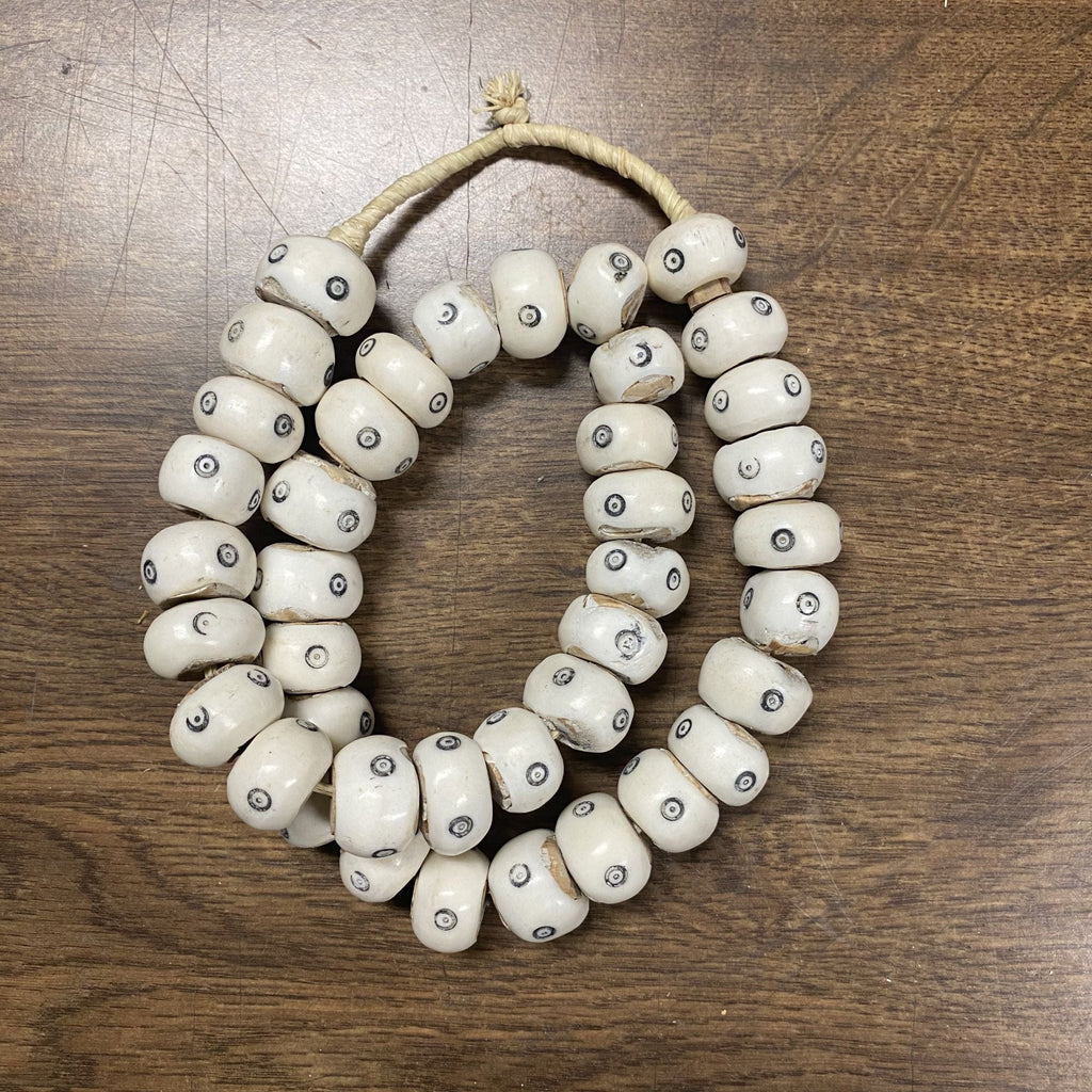 White Drum Eyes Kenya Cow Bone Beads Per String