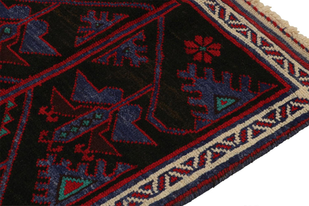 Vintage Balouch Persian Rug In Black With Red & Blue Patterns