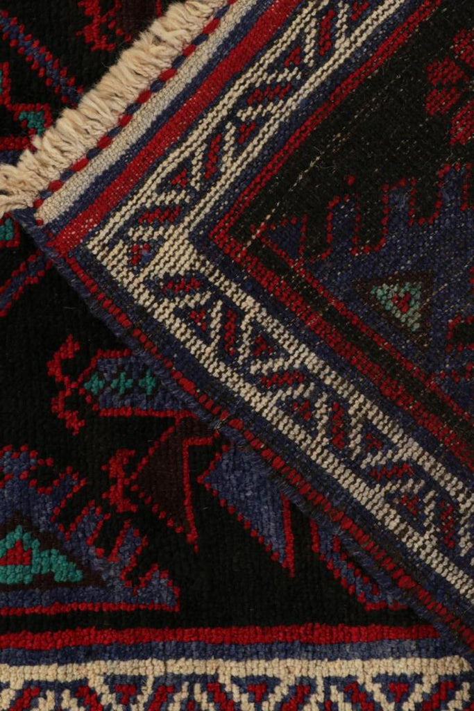 Vintage Balouch Persian Rug In Black With Red & Blue Patterns