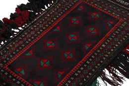 Vintage Balouch Persian Rug In Black Red & Green Patterns