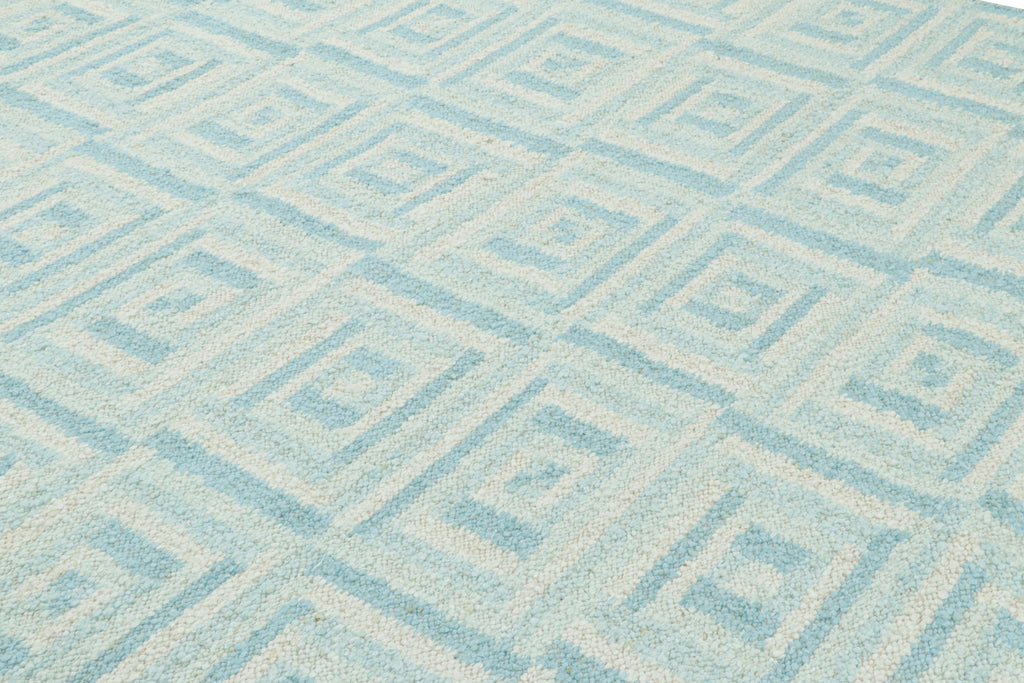 Scandinavian Rug With Light Blue And White Geometric Patterns