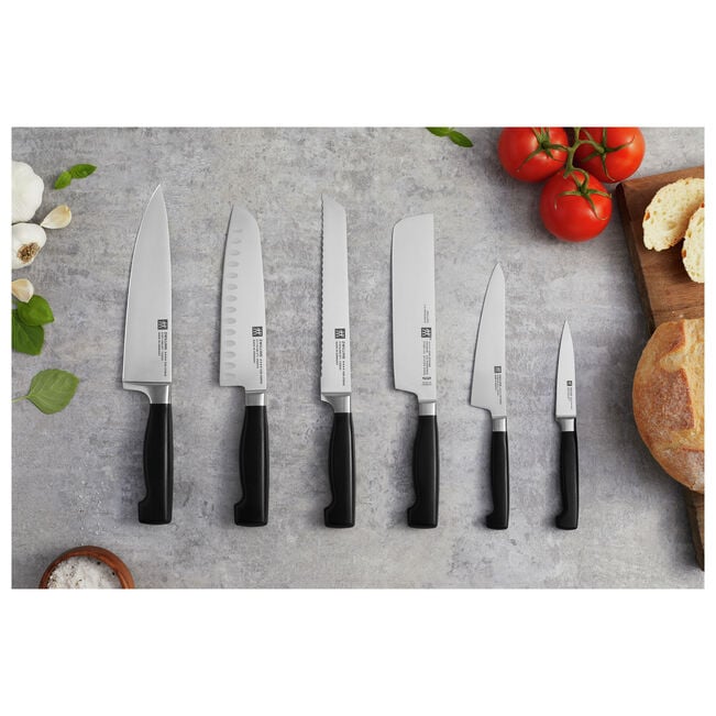 Zwilling Four Star Hollow Edge Santoku Knife