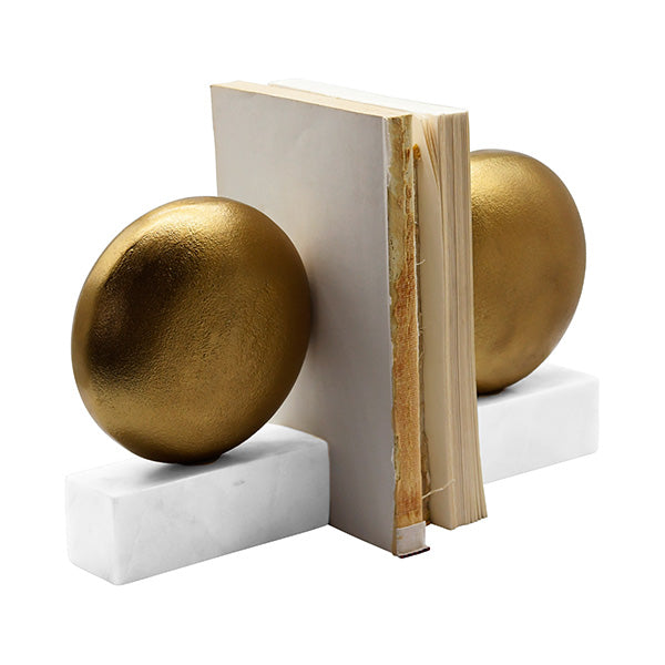 Disk Shaped Textured Brass Metal Bookend With Square White Marble Base