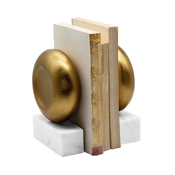 Disk Shaped Textured Brass Metal Bookend With Square White Marble Base