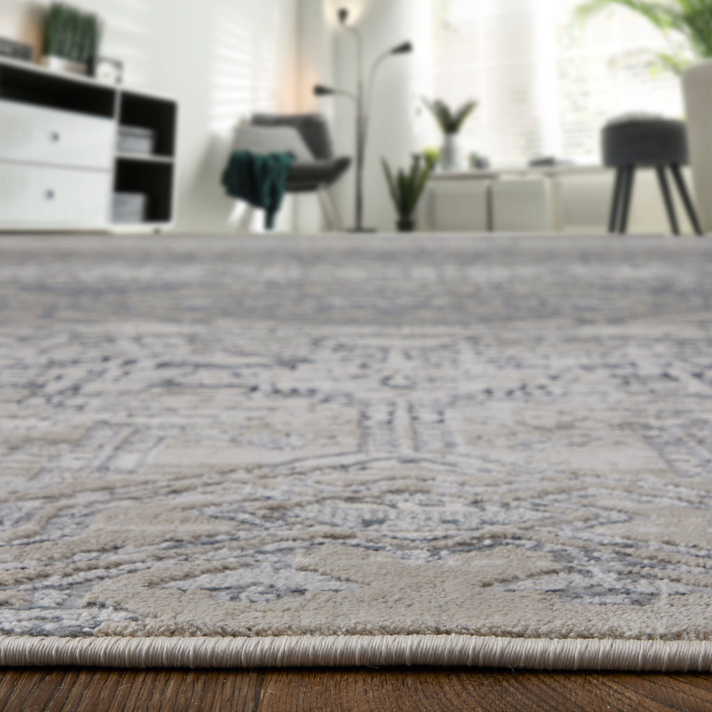 Macklaine Transitional Distressed Ivory Silver Black Area Rug (6'7" x 9'6")