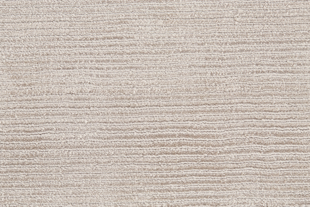 Batisse Modern Solid Ivory Taupe Area Rug (3'6" x 5'6")