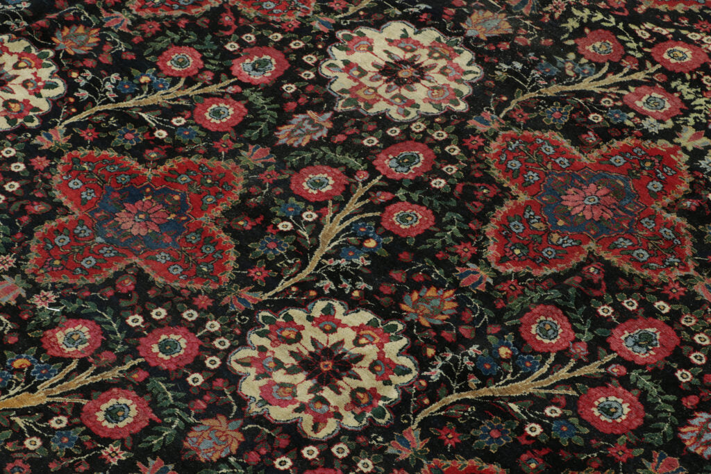 Antique Persian Rug In Black With Red Floral Patterns “ By Rug & Kilim